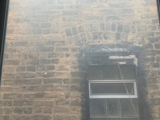 Window in Chicago, IL before window cleaning